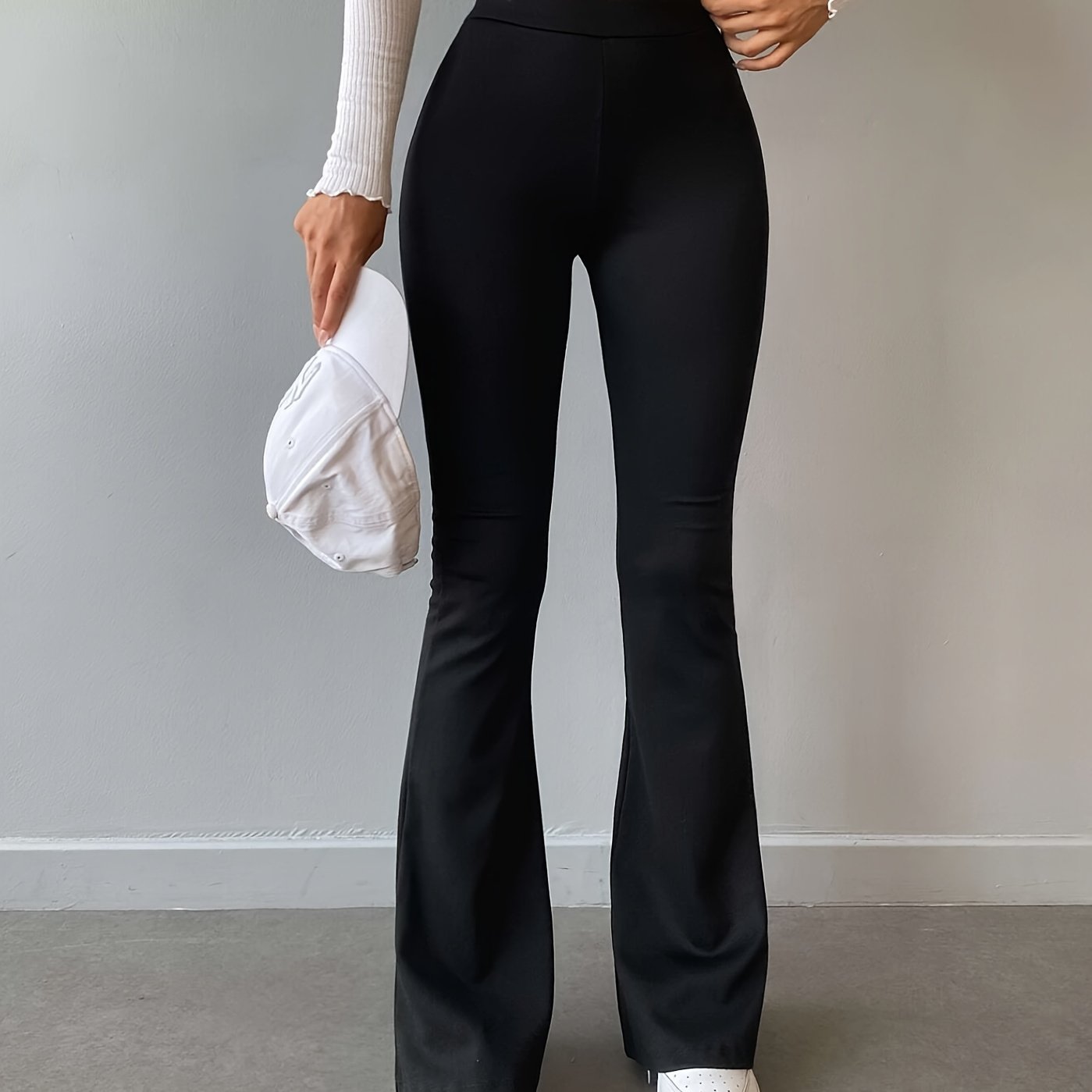 Forbidden Pants signature flare silhouette in black